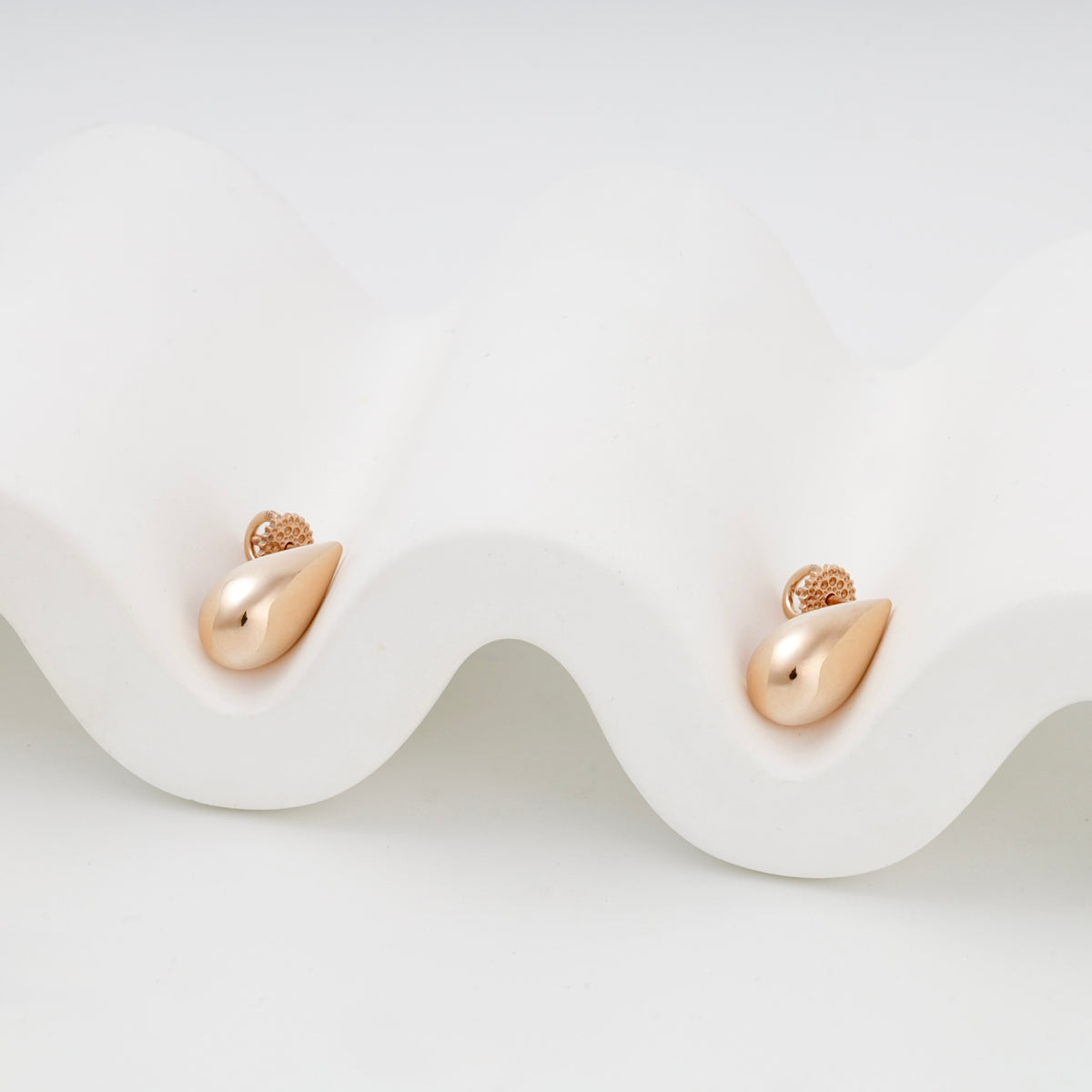 Polished teardrop stud earring pair in Rose Gold 14K