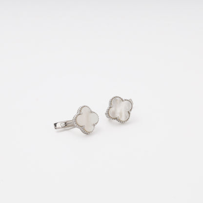 Silver mother-of-pearl earrings overhead view — Kabluchka