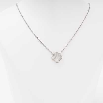 Silver necklace clover pendant close up on bust — Kabluchka