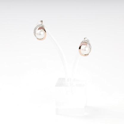 Pearl and cubic zirconia earrings with English locks — angled view — Kabluchka