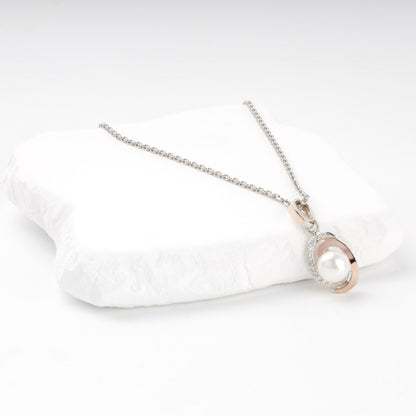Silver and Gold 375 pearl pendant — angled view — Kabluchka