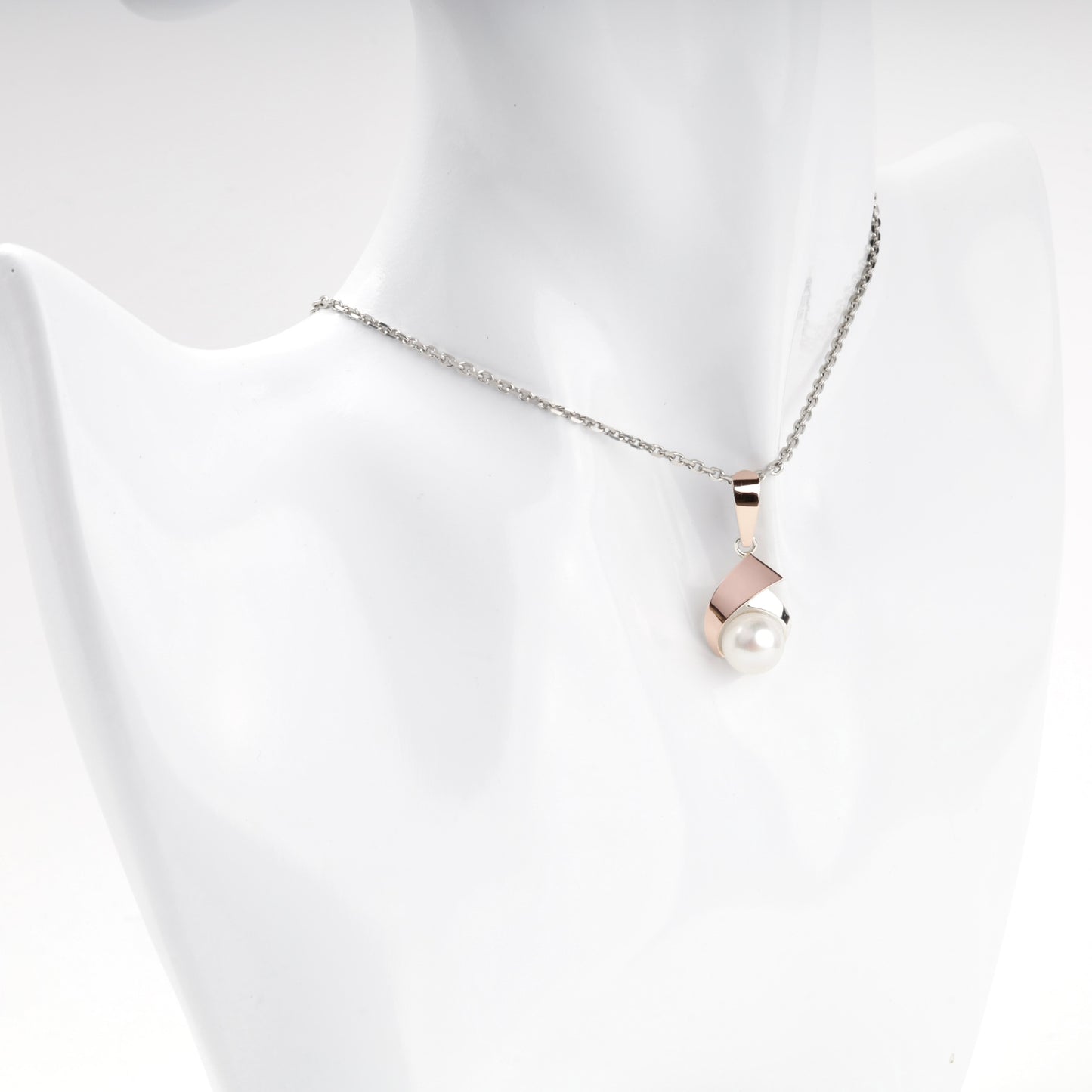 Cultured pearl pendant with warm rose-tone detail — worn view — Kabluchka
