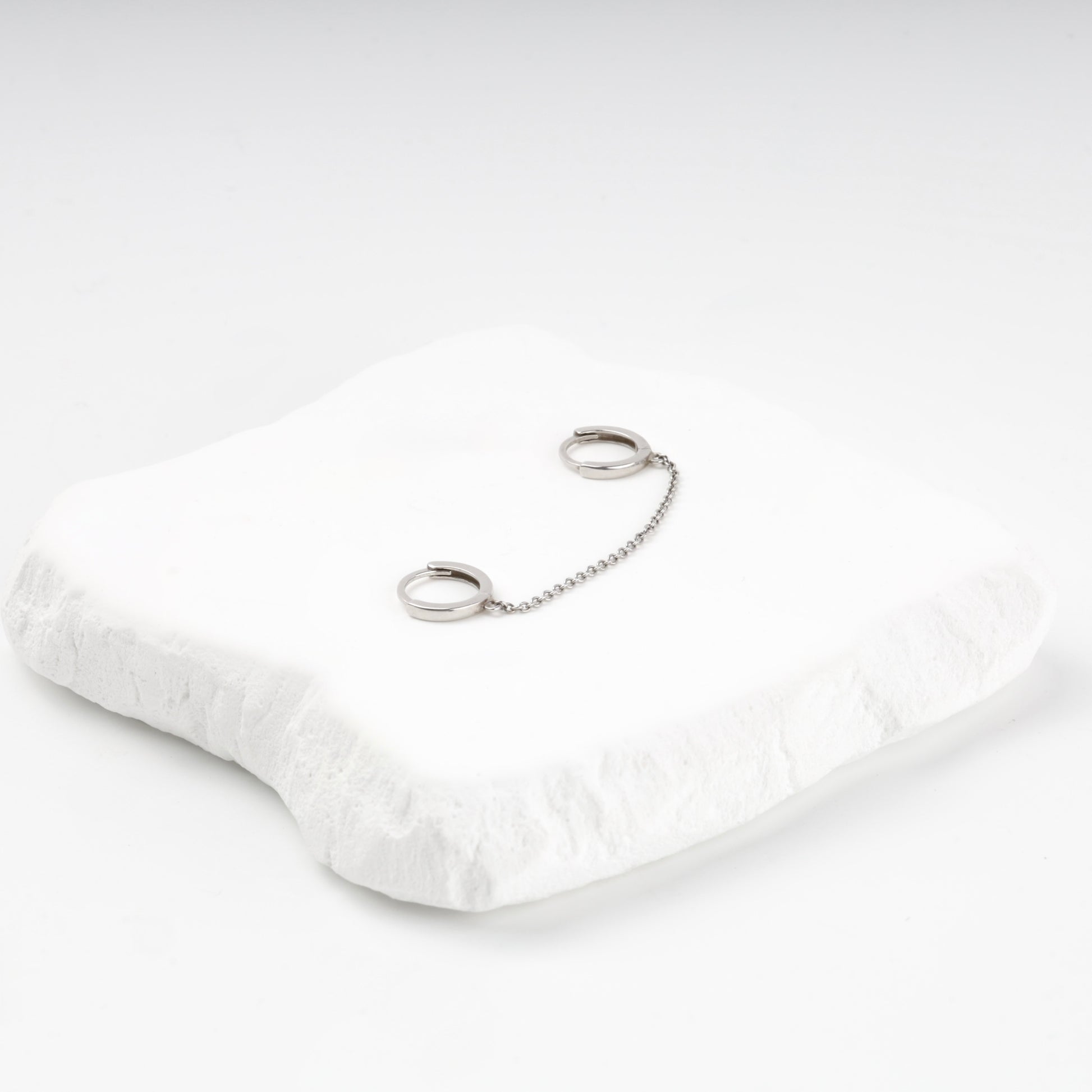 Minimalist silver 925 huggie hoops with clicker closure — Kabluchka