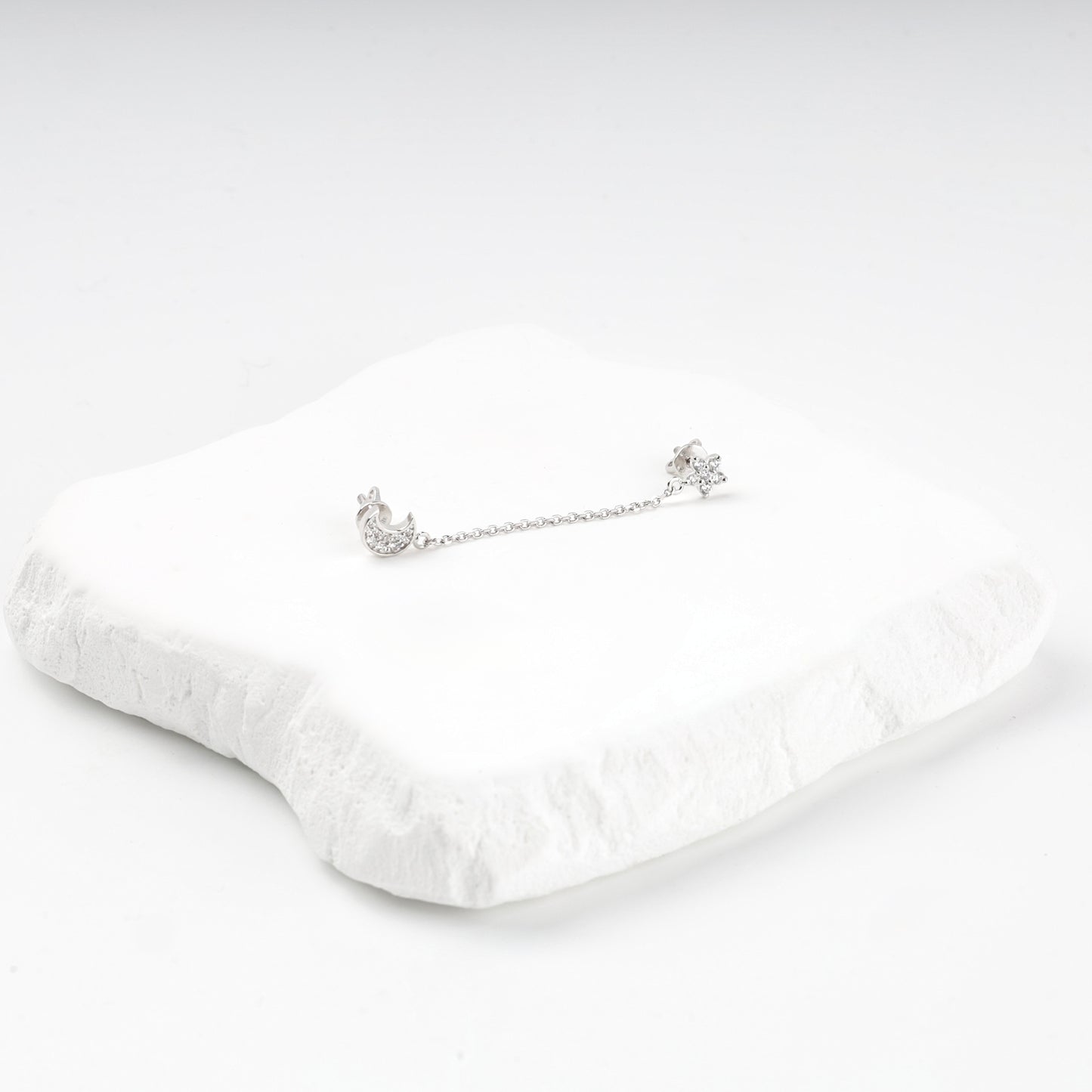 Silver 925 pavé crescent moon and star studs linked by a fine chain — Kabluchka