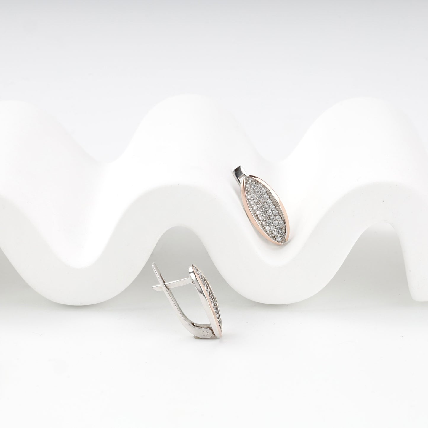 Leaf-shaped cubic zirconia drop earrings — front view — Kabluchka