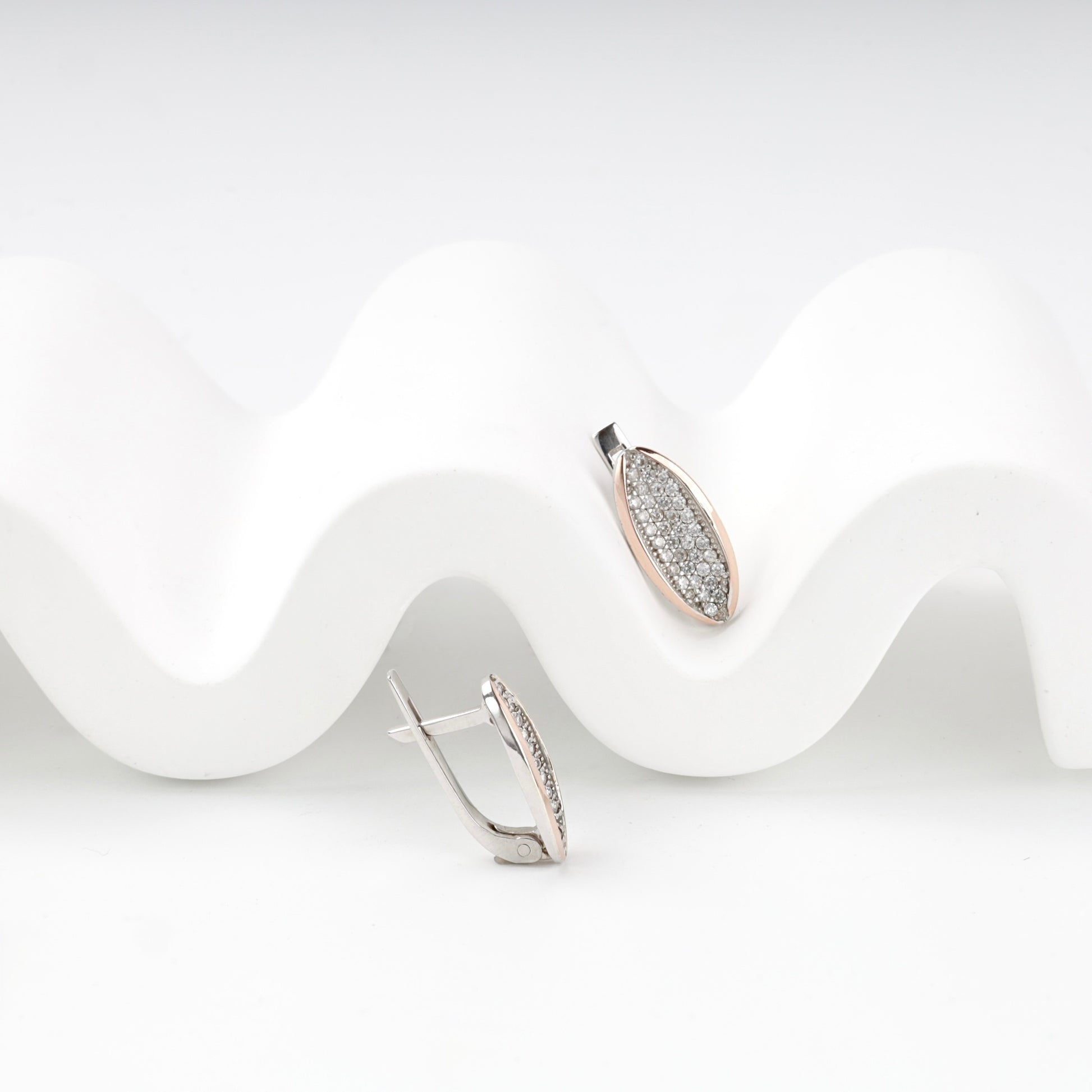 Leaf-shaped cubic zirconia drop earrings — front view — Kabluchka