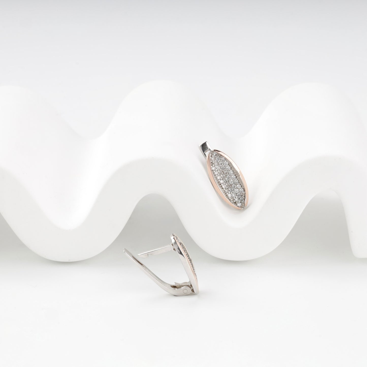 Tapered cubic zirconia earring fronts — detail — Kabluchka
