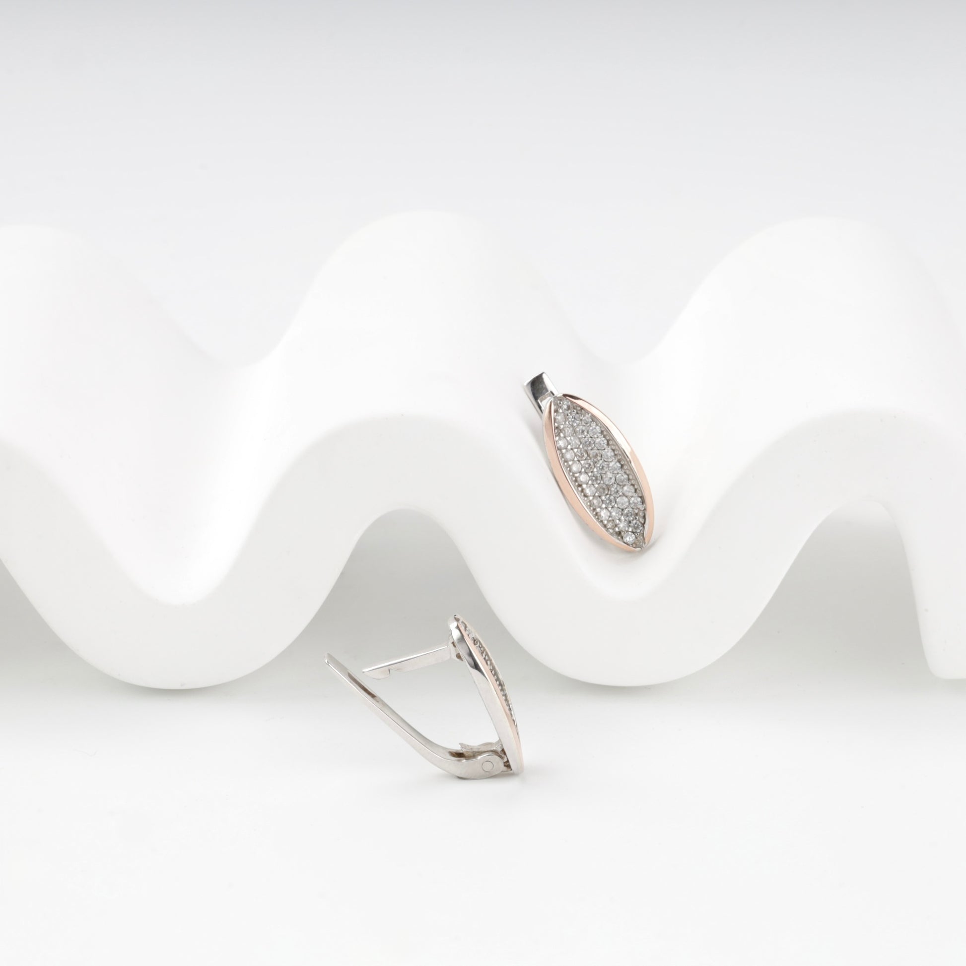 Tapered cubic zirconia earring fronts — detail — Kabluchka