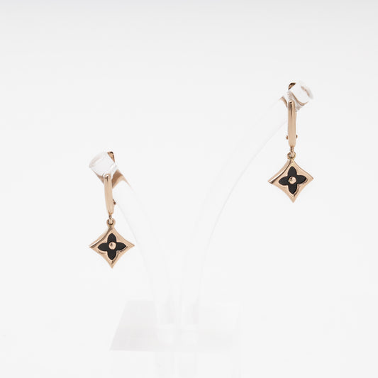 Rose gold 585 drop earrings with onyx star front view - Kabluchka