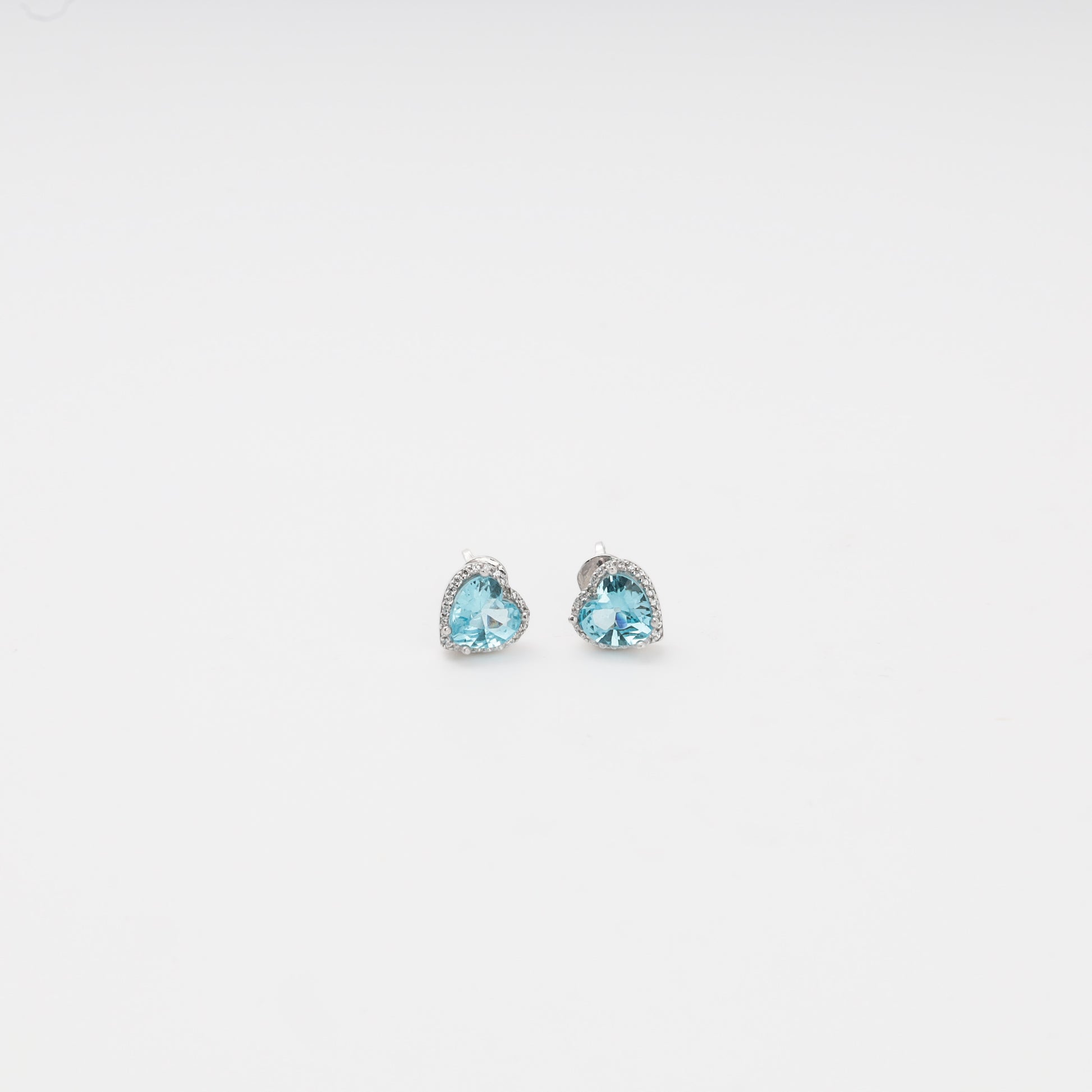 Silver 925 Blue CZ Heart Stud Earrings on display — Kabluchka