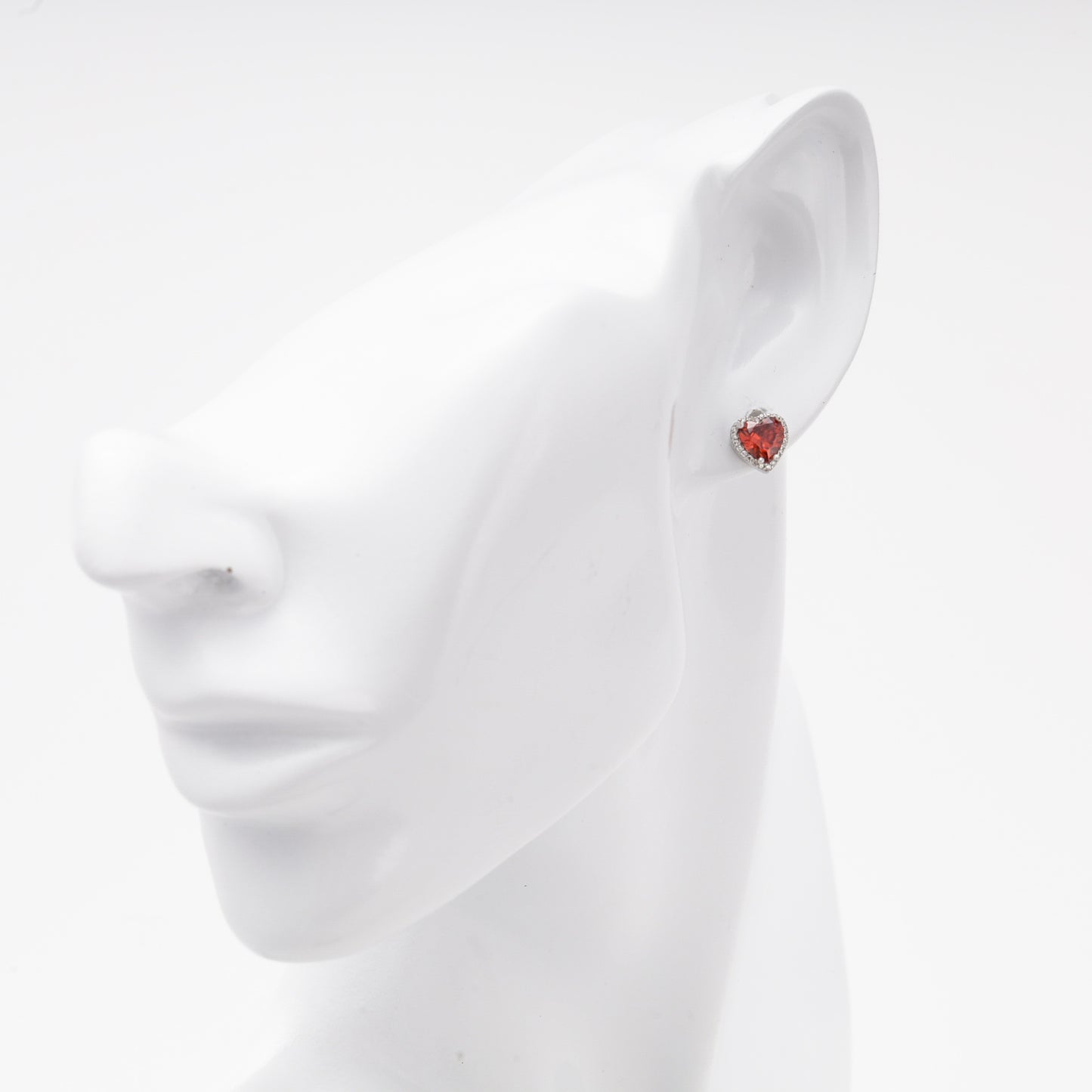 Silver 925 heart stud earring with red cubic zirconia, worn — Kabluchka