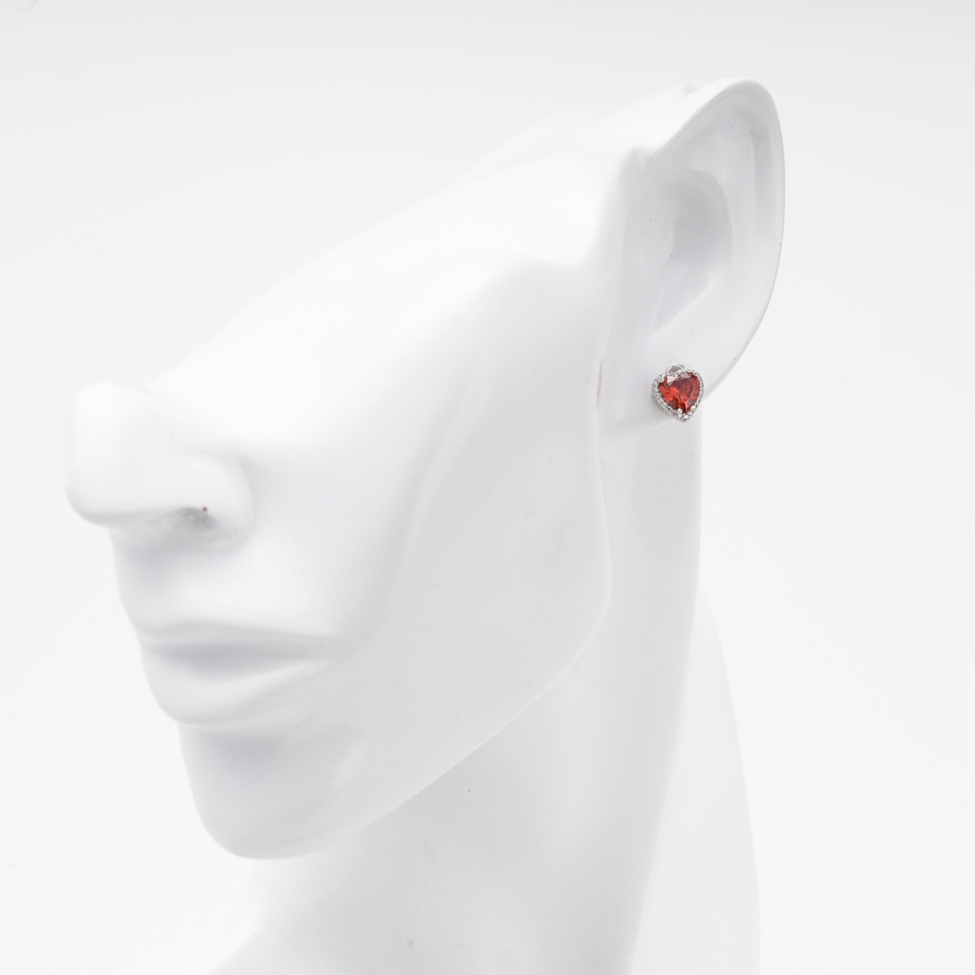 Silver 925 heart stud earring with red cubic zirconia, worn — Kabluchka
