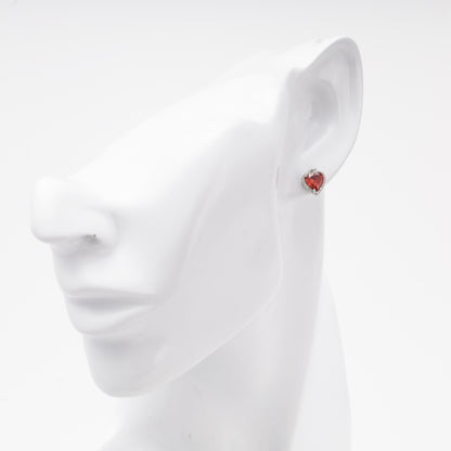 Silver 925 heart stud earring with red cubic zirconia, worn — Kabluchka