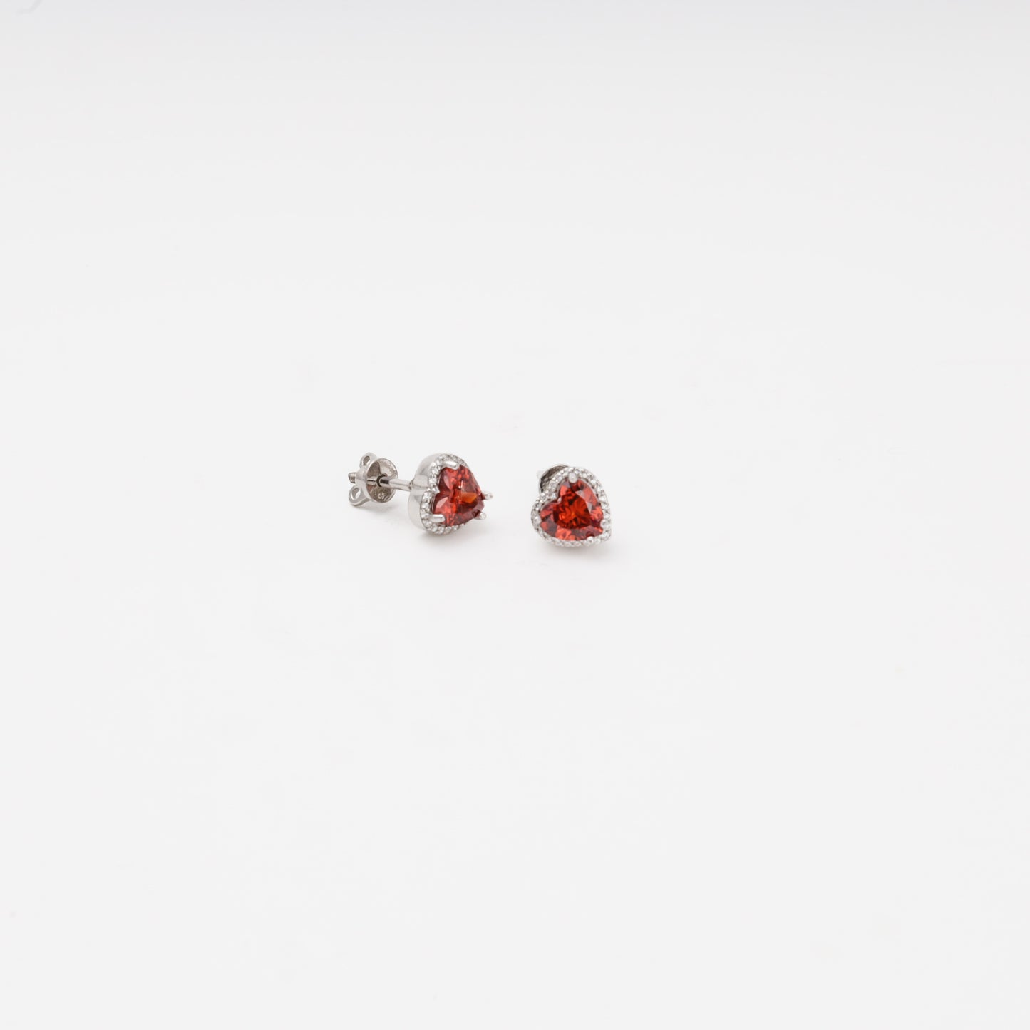 Silver 925 red heart stud earrings close-up — Kabluchka