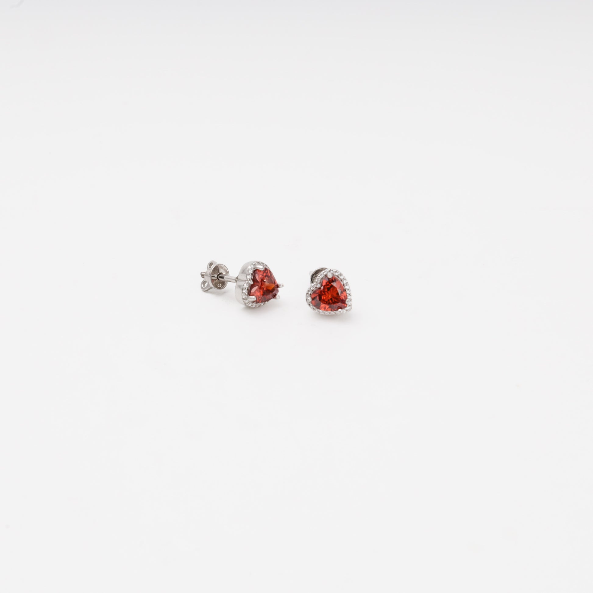 Silver 925 red heart stud earrings close-up — Kabluchka