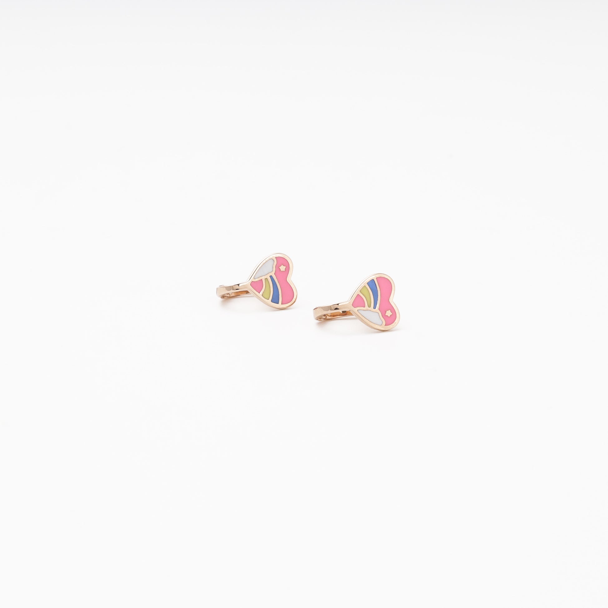 Children's rose gold heart earrings with rainbow enamel, angled top view — Kabluchka