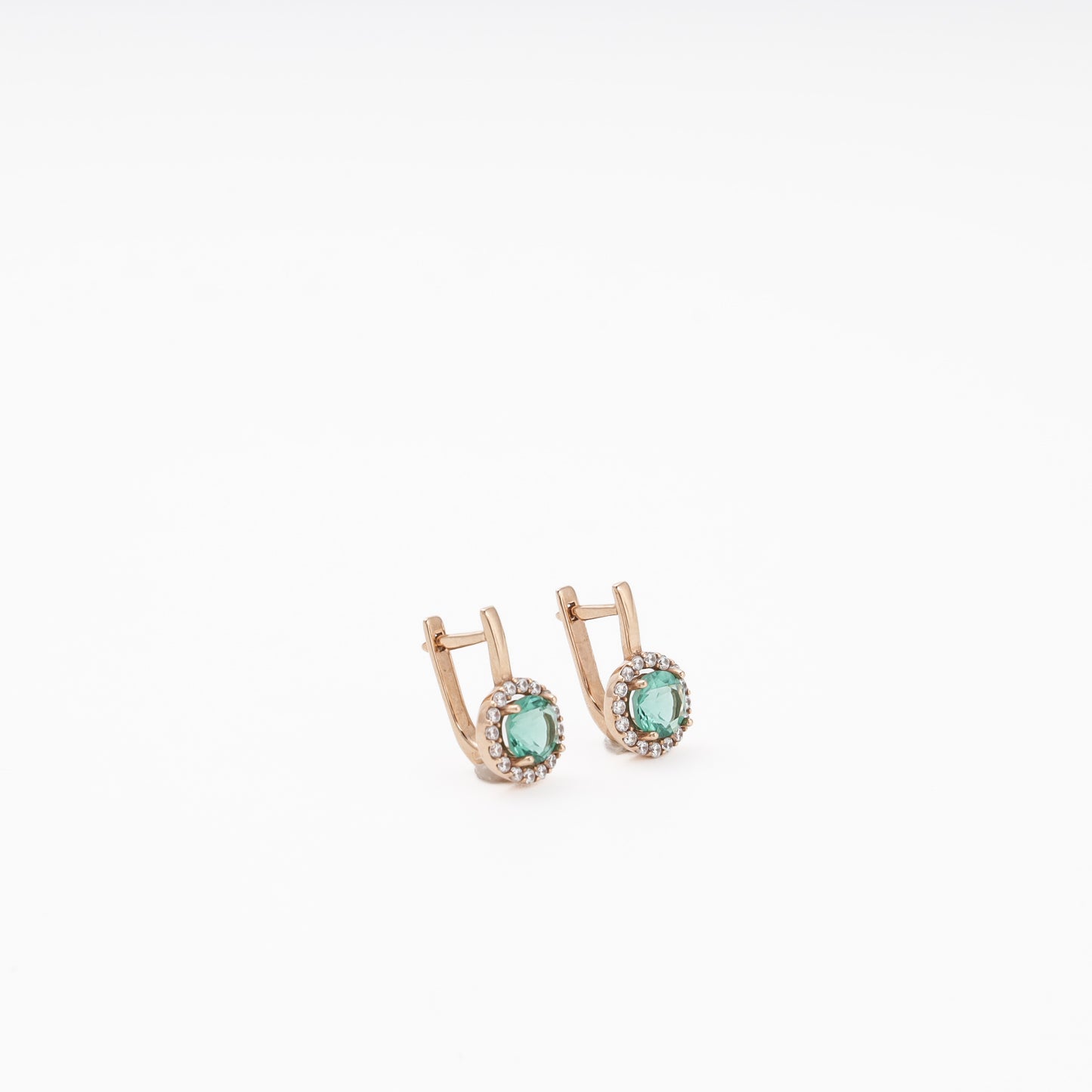 Rose gold drop earrings with green quartz and CZ halo, angled view — Kabluchka