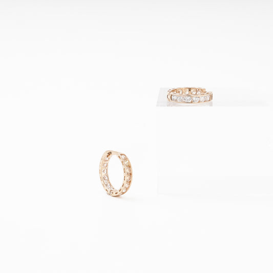 Gold 585 huggie earrings with royal white and champagne CZ side view - Kabluchka