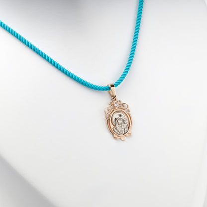 Ornate rose and white gold religious pendant with clear cubic zirconia