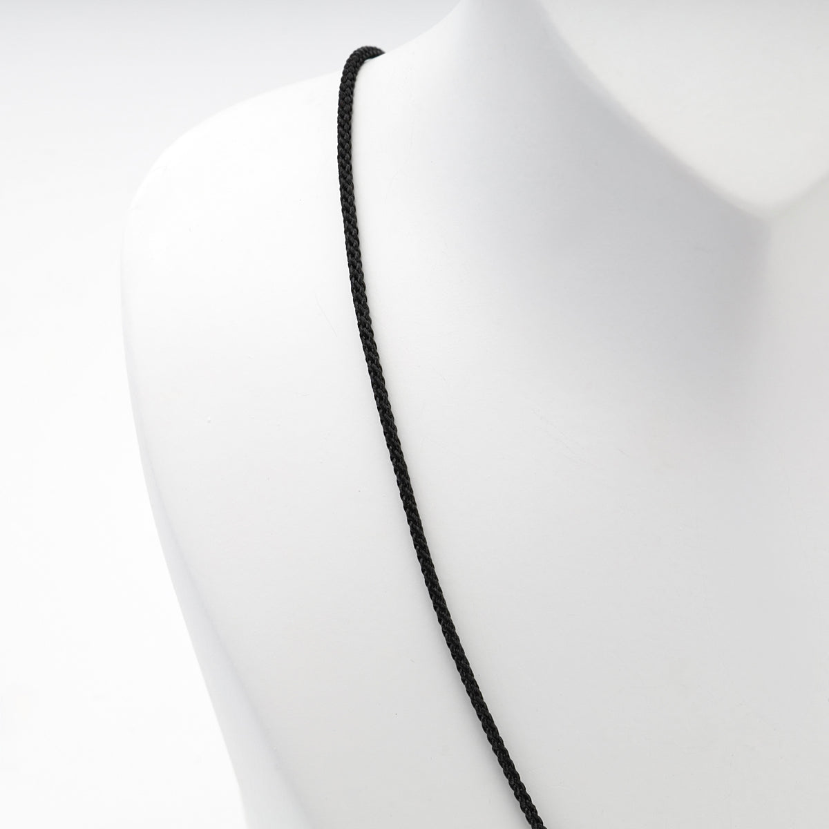 Fine black braided silk cord necklace detail — Kabluchka