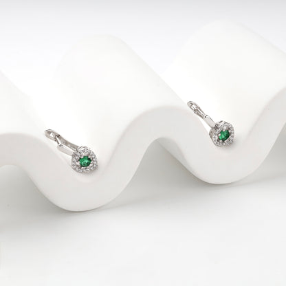 Silver 925 green cubic zirconia heart halo earrings on display — Kabluchka