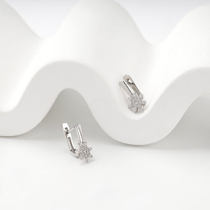 Silver 925 cubic zirconia star earrings on display — angled view — Kabluchka