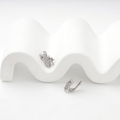 Silver 925 unicorn earrings showing front and side profile