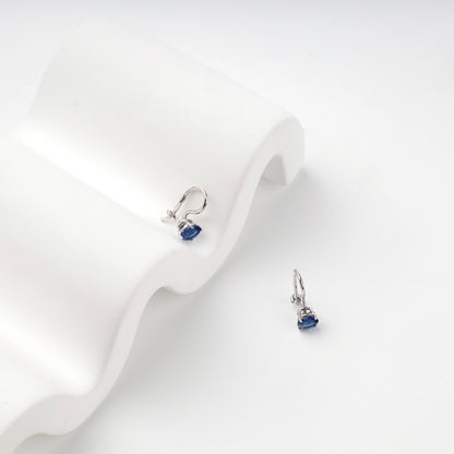 Children's blue cubic zirconia earrings, angled view