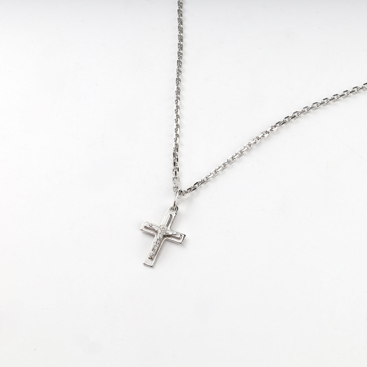 Silver 925 open-frame crucifix pendant, angled view