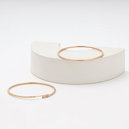 Rose Gold 585 Diamond-Cut Hoop Earrings 48 mm — on display stand — Kabluchka