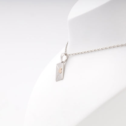 Silver 925 Envelope Pendant with Gold Heart on display — Kabluchka