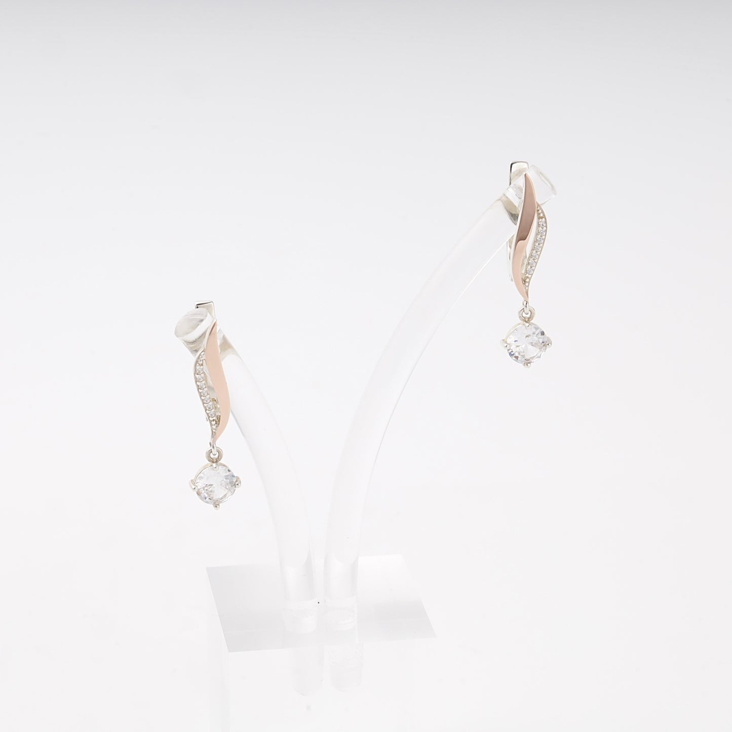 Silver 925 twist drop earrings with cubic zirconia and rose gold — Kabluchka