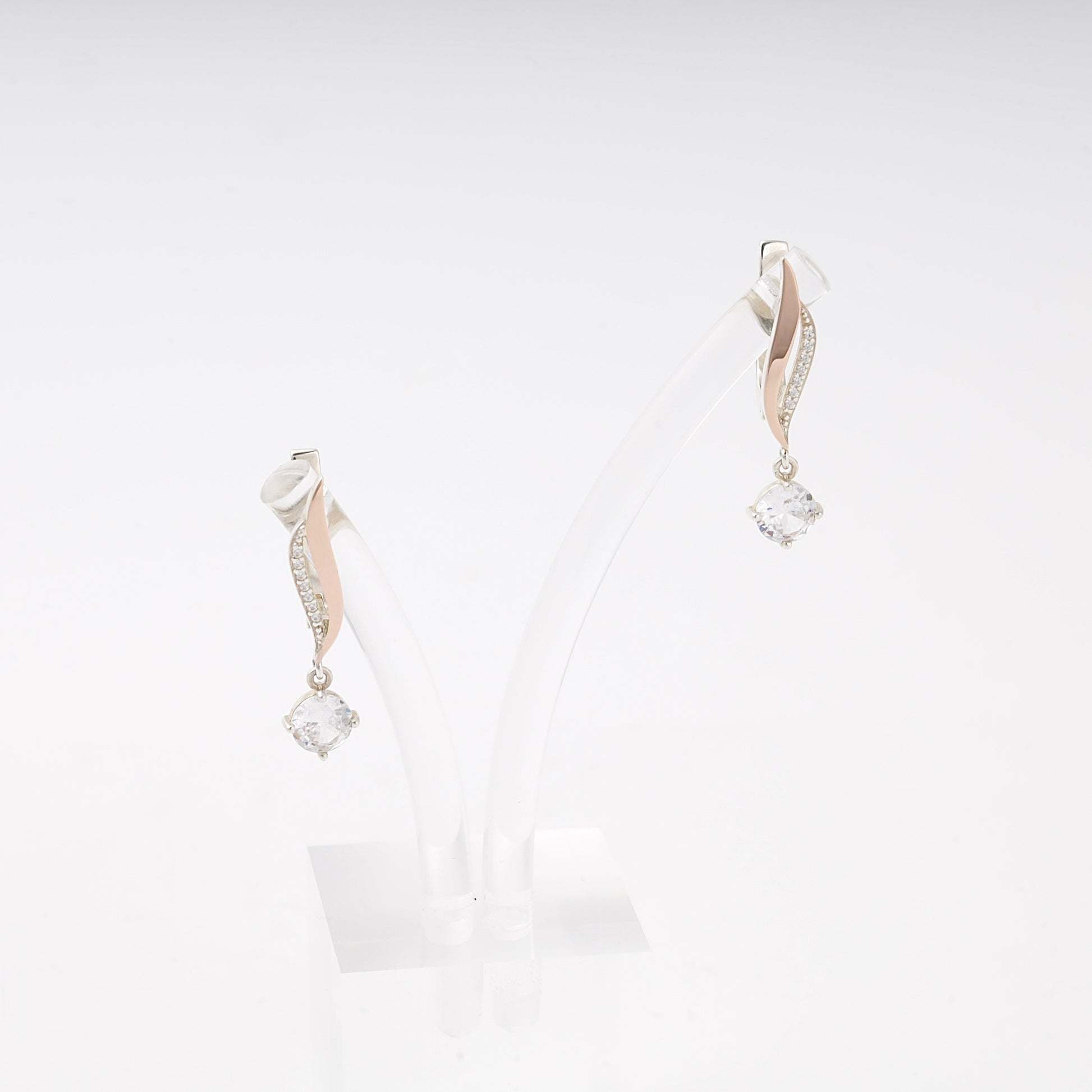 Silver 925 twist drop earrings with cubic zirconia and rose gold — Kabluchka