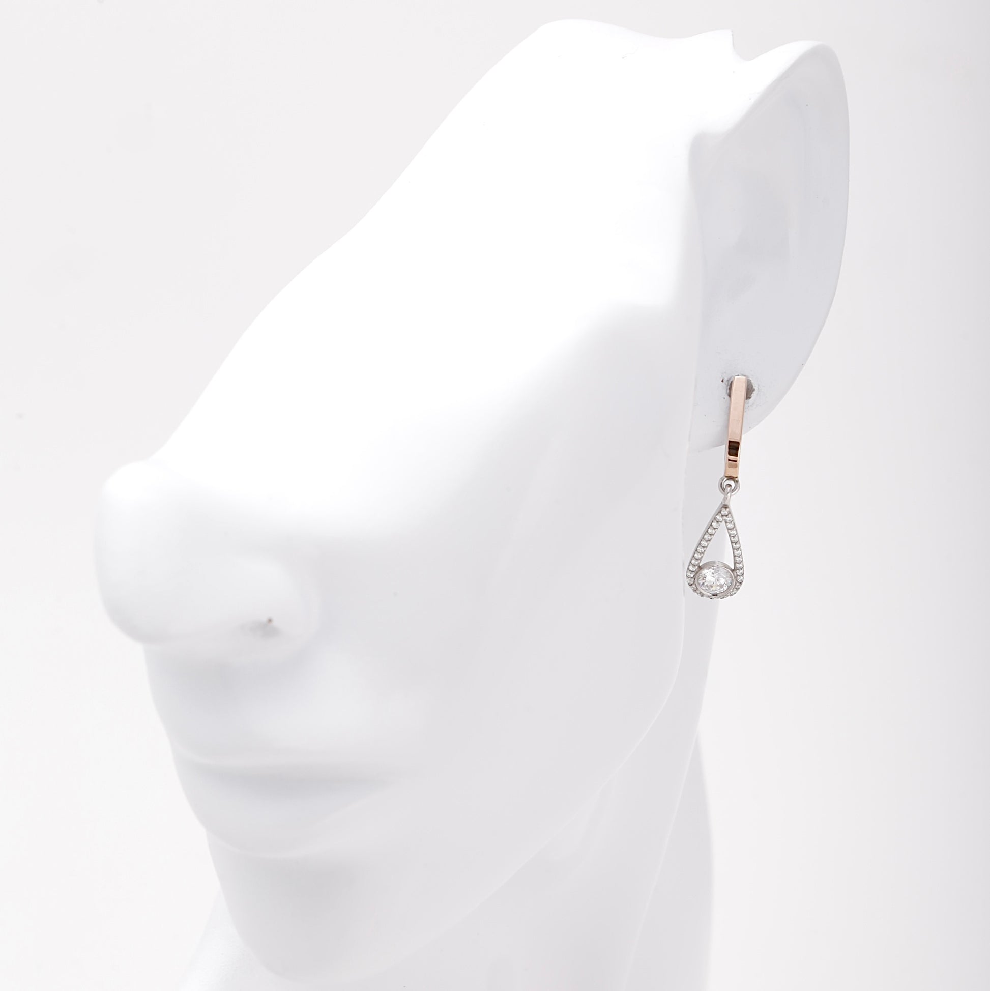 Silver 925 cubic zirconia teardrop drop earring shown on ear — Kabluchka