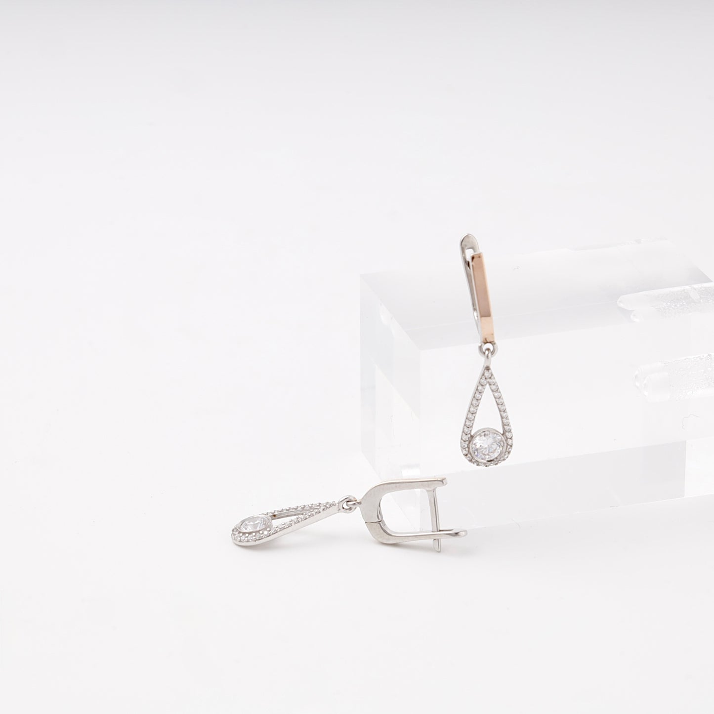 Silver 925 teardrop drop earrings, angled view — Kabluchka