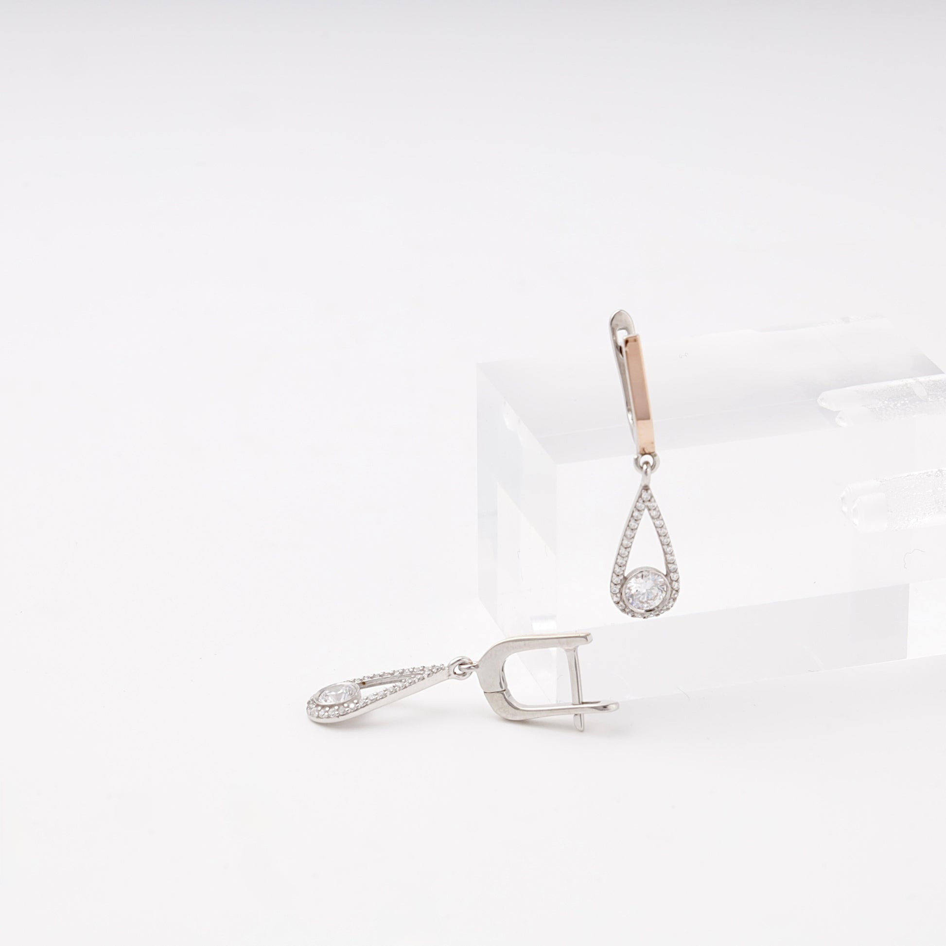 Silver 925 teardrop drop earrings, angled view — Kabluchka