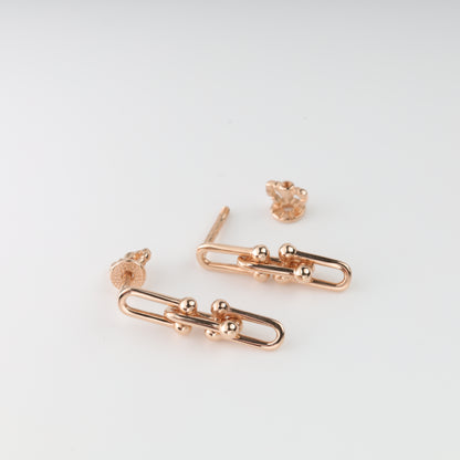 Rose gold 585 double link drop earrings close-up - Kabluchka