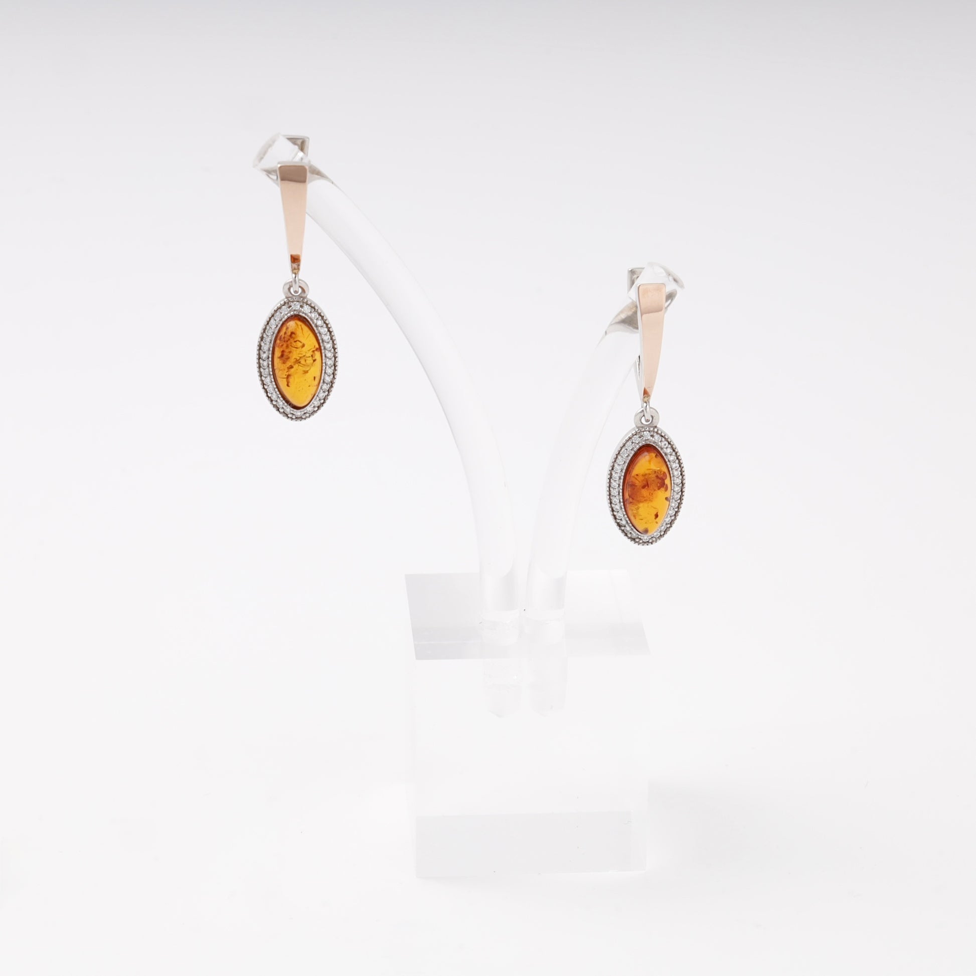 Silver 925 amber drop earrings on display stand — Kabluchka