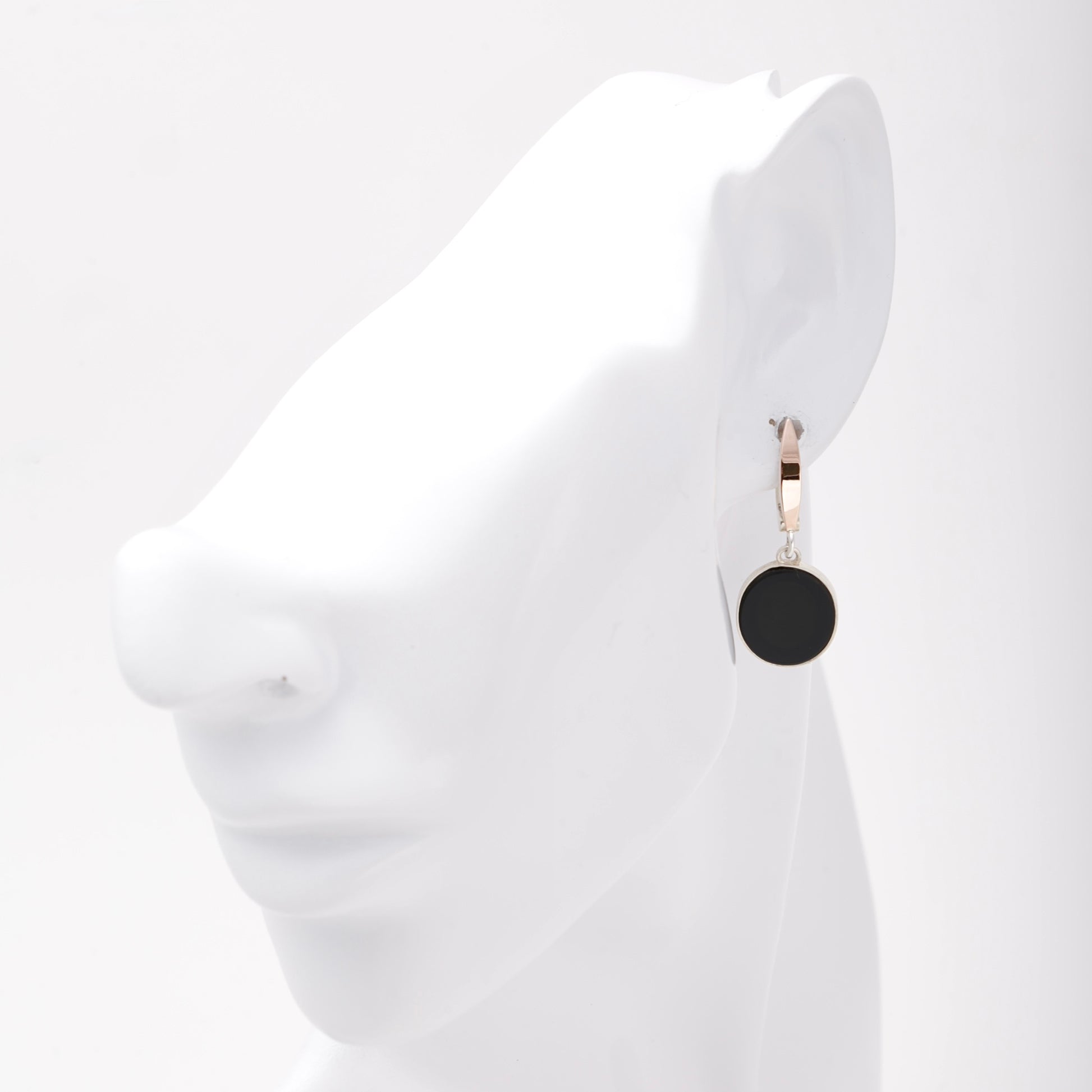 Silver 925 onyx drop earring shown on ear — Kabluchka