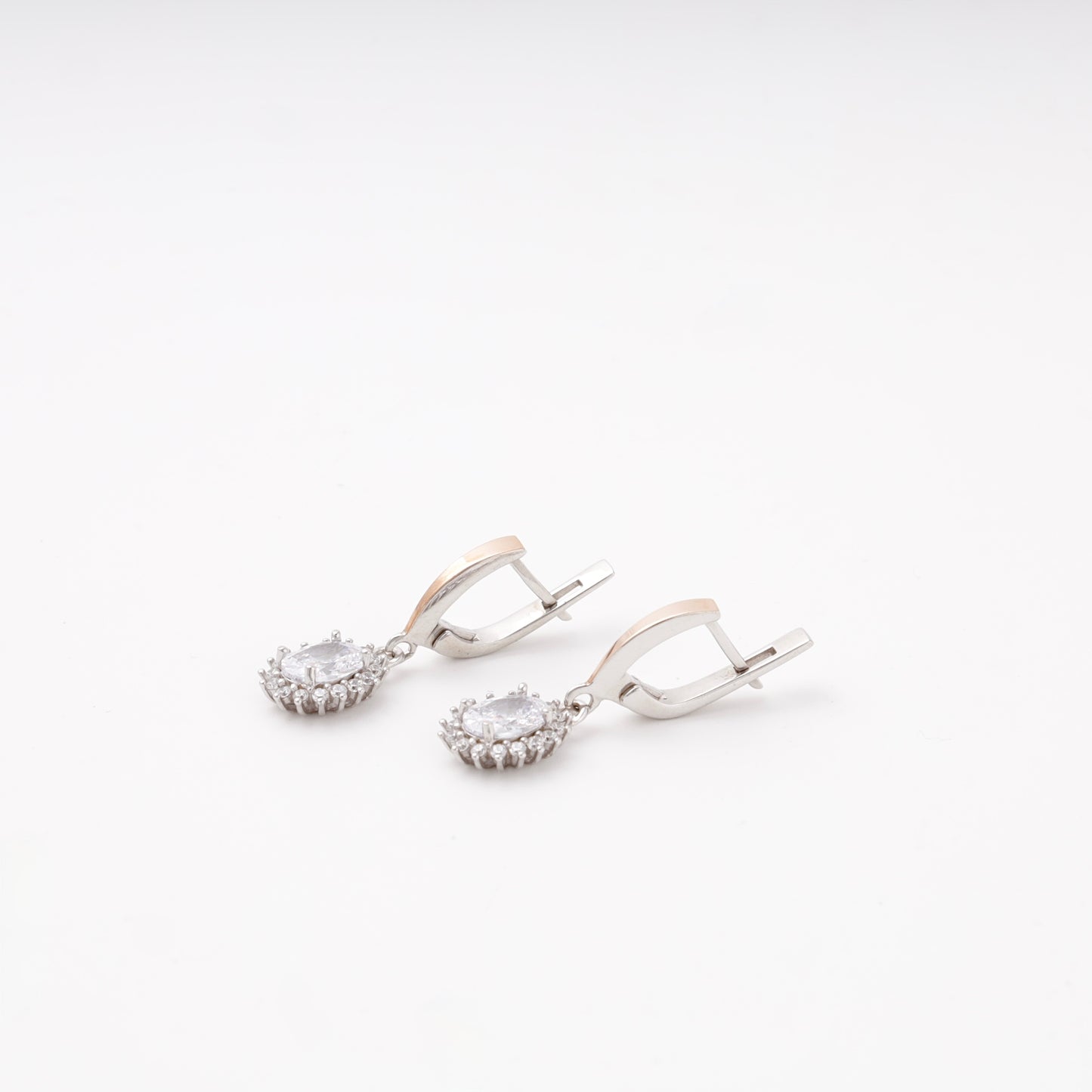 Silver 925 oval halo drop earrings, angled view — Kabluchka