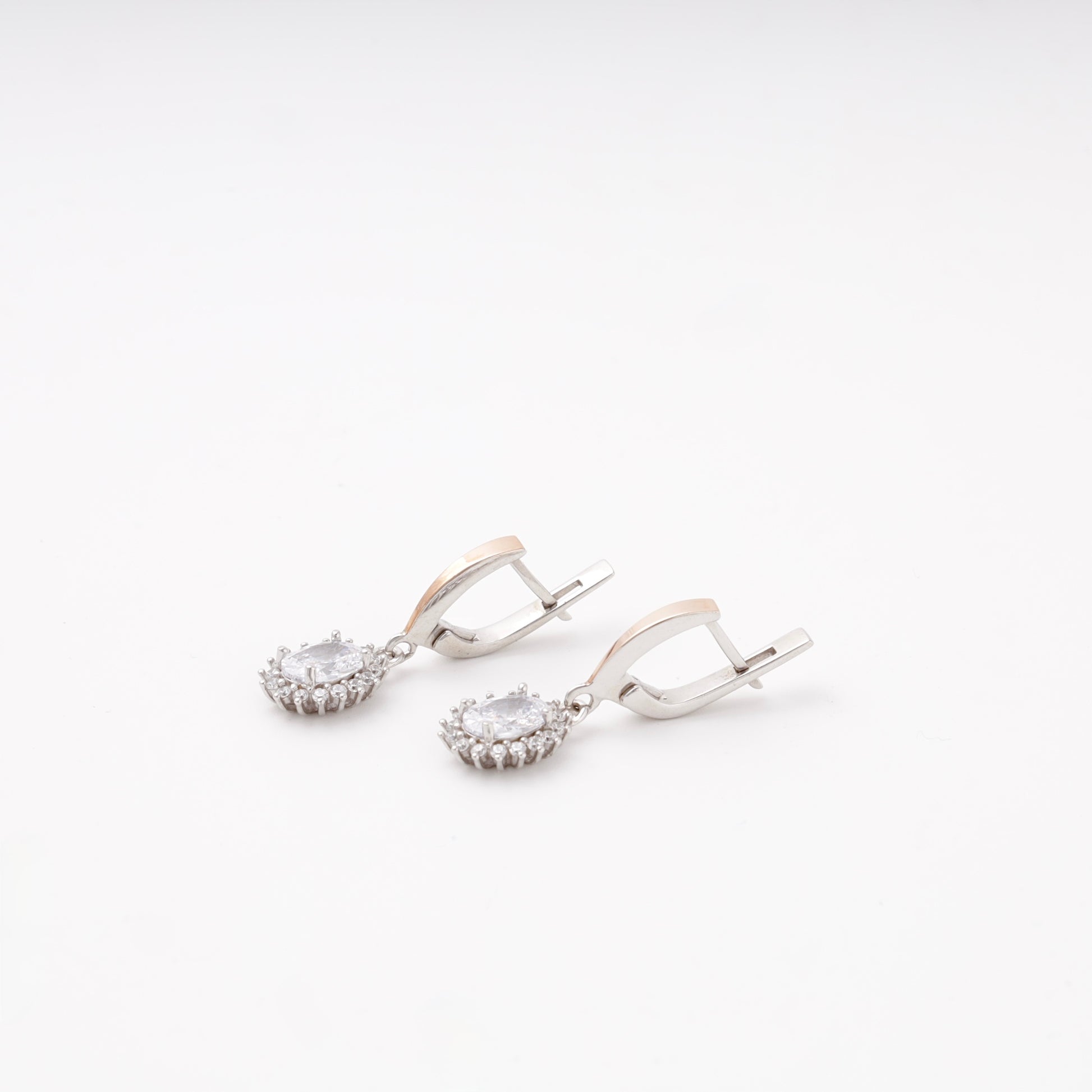 Silver 925 oval halo drop earrings, angled view — Kabluchka