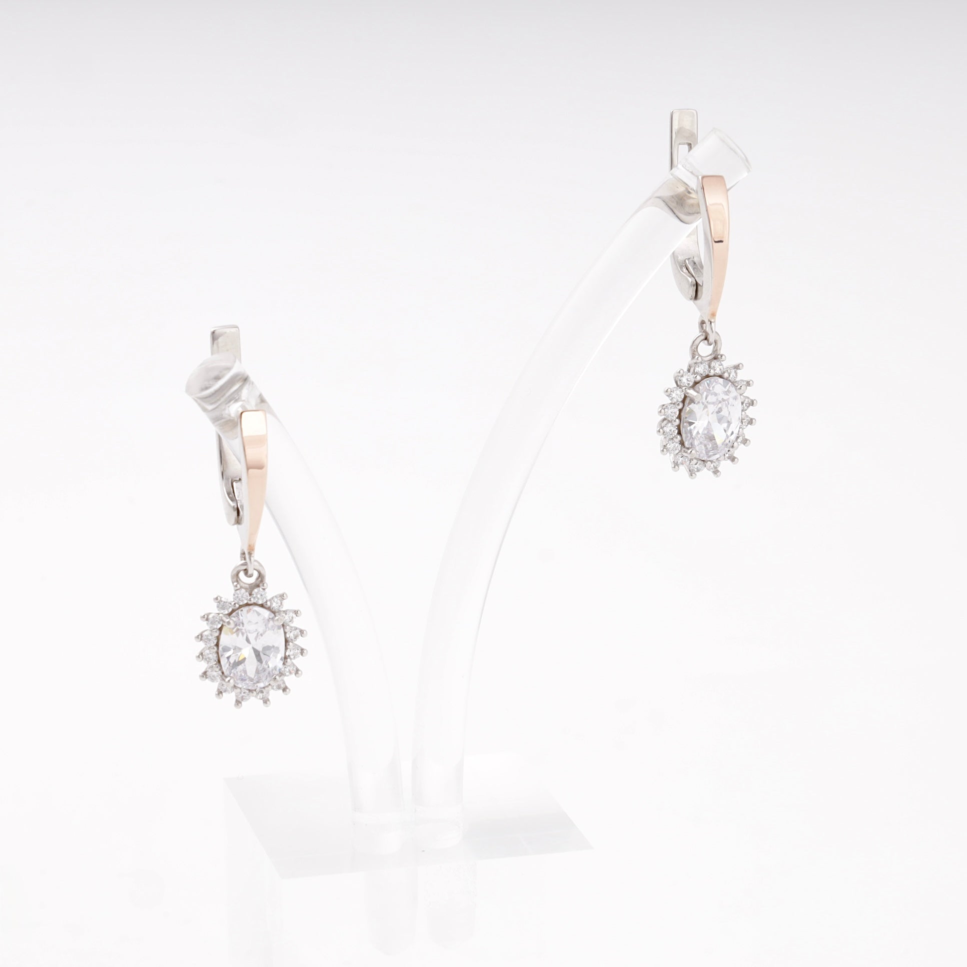 Silver 925 cubic zirconia oval halo drop earrings on a stand — Kabluchka