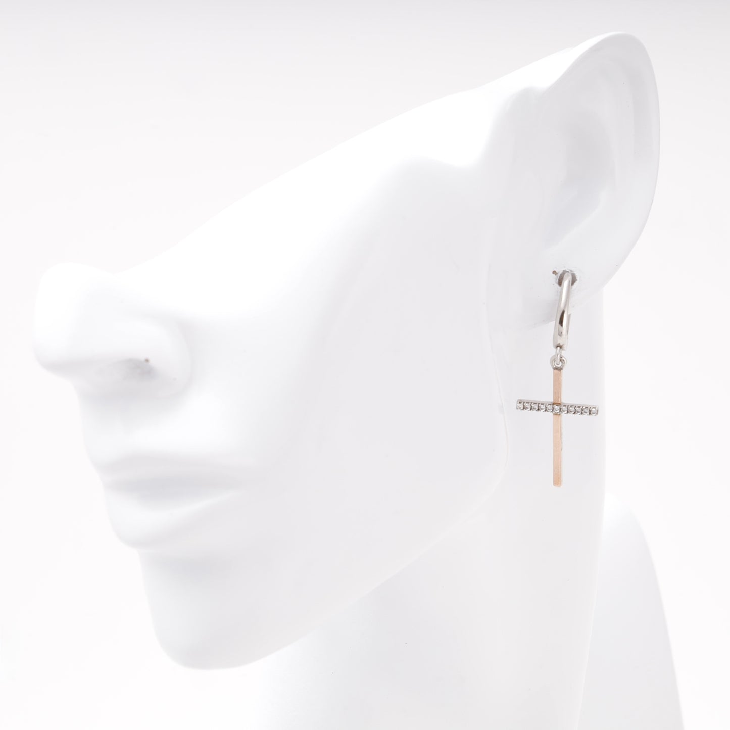 Silver 925 cross drop earring shown on ear — Kabluchka