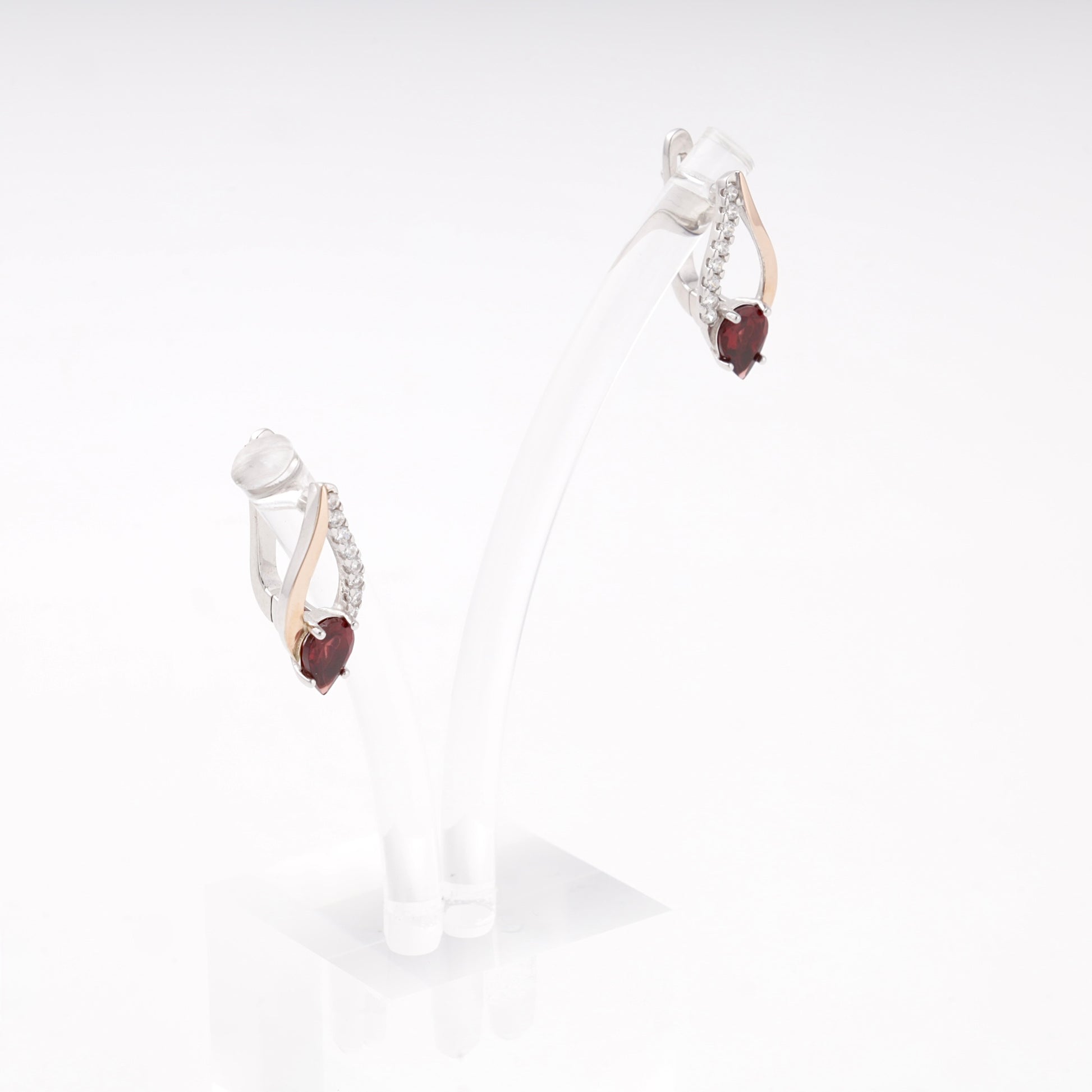 Silver 925 garnet drop earrings on display stand — Kabluchka