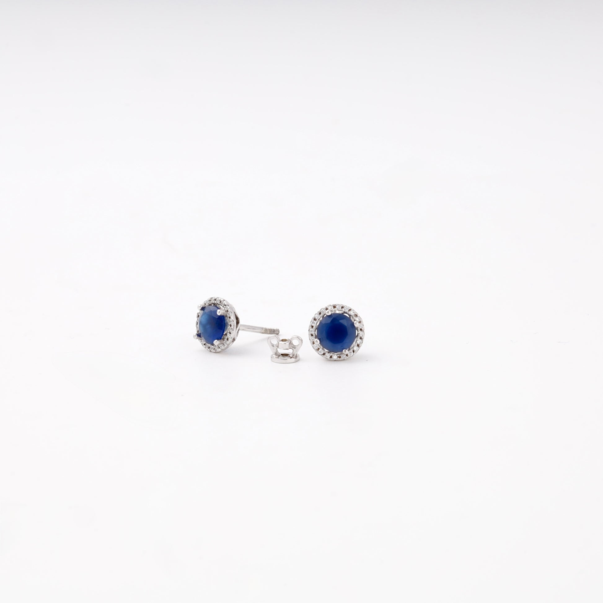 Blue sapphire silver 925 stud earrings, side view — Kabluchka