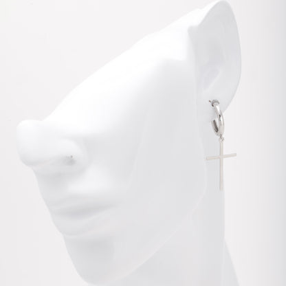 Silver 925 cross huggie hoop earring shown on ear model — Kabluchka