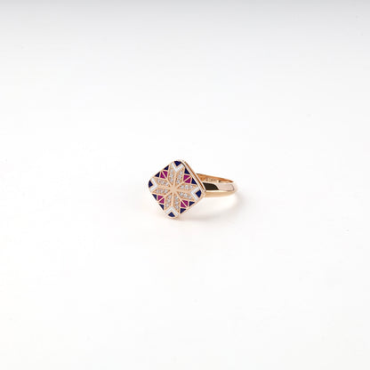 Geometric Ukrainian enamel ornament with cubic zirconia border, close view