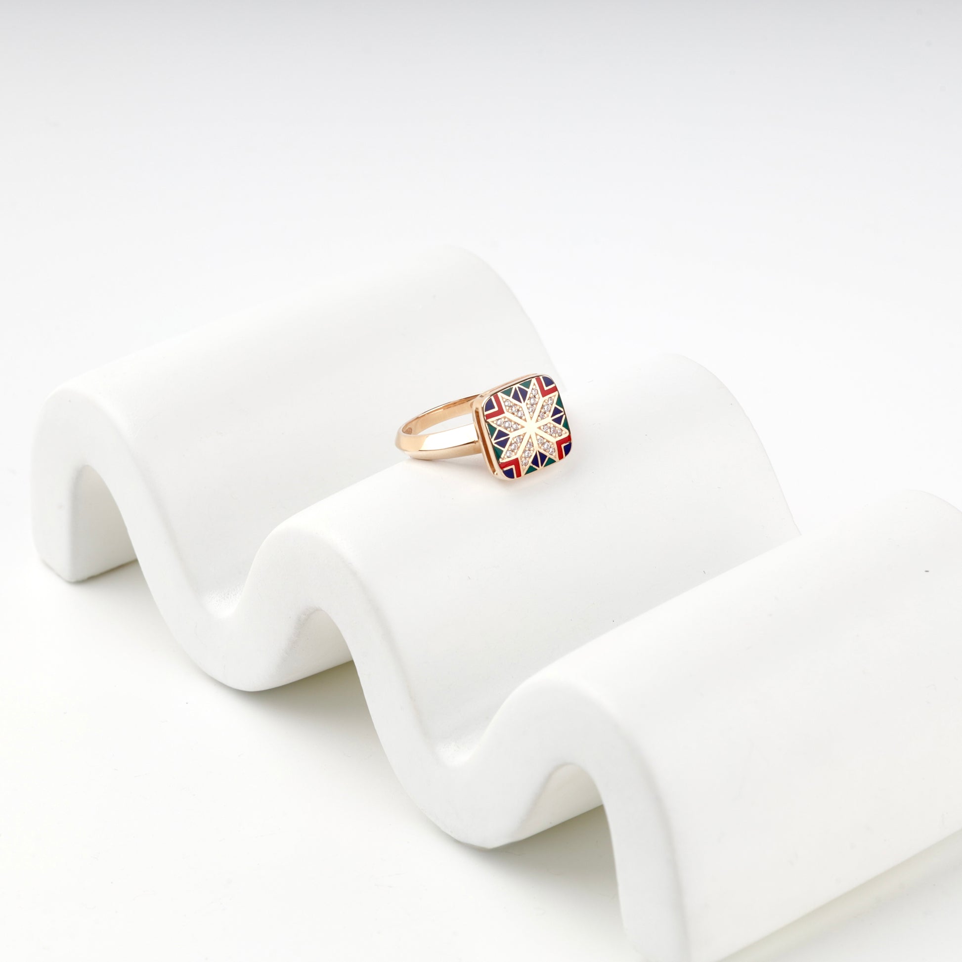 Geometric Ukrainian enamel ring with cubic zirconia border, close view