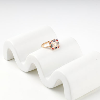 Geometric Ukrainian enamel ring with cubic zirconia border, close view