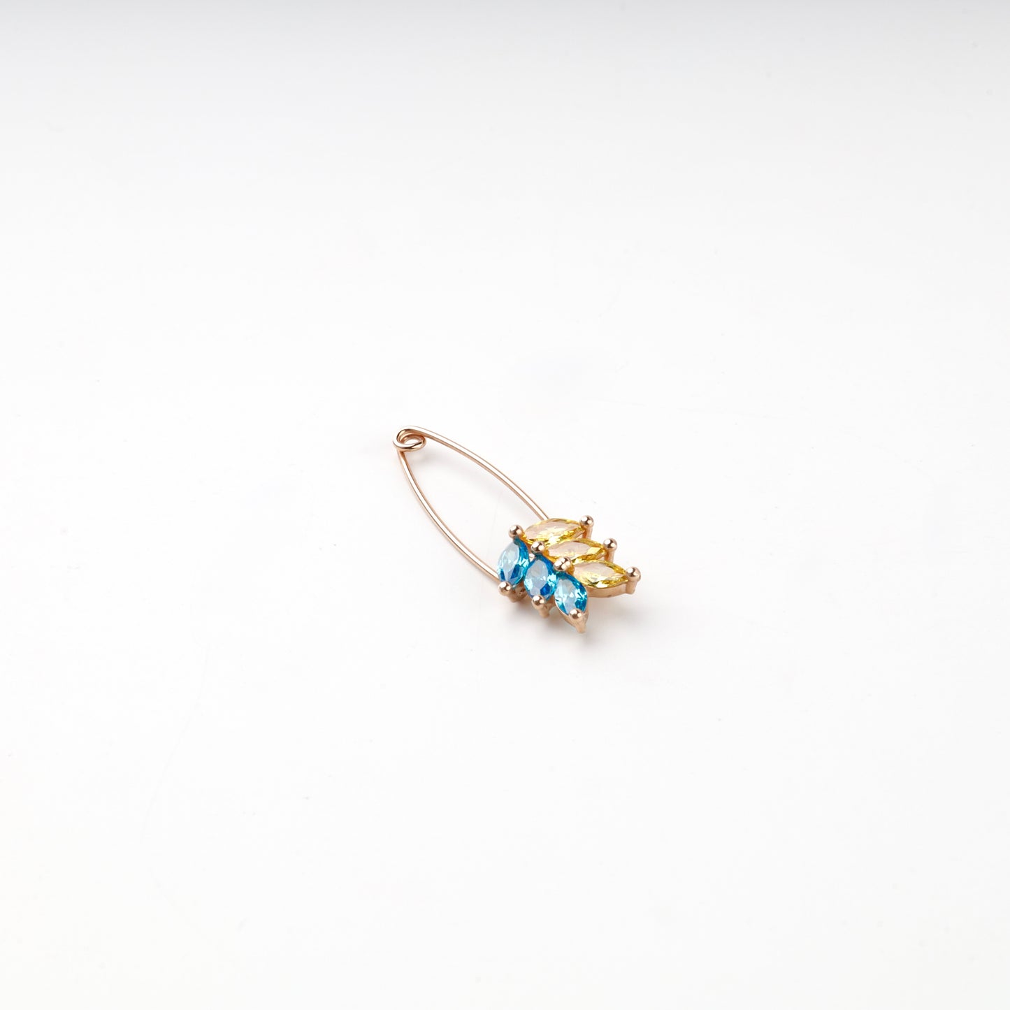 Blue and yellow marquise zirconia wheat motif, close view
